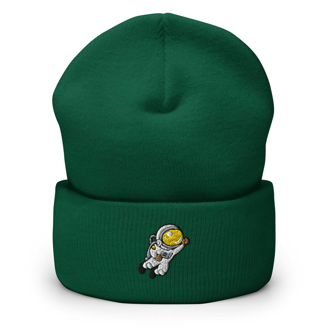 a green beanie with an astronaut on it
