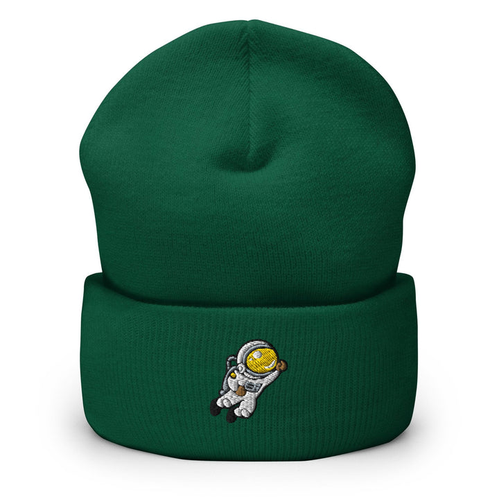 a green beanie with an astronaut on it