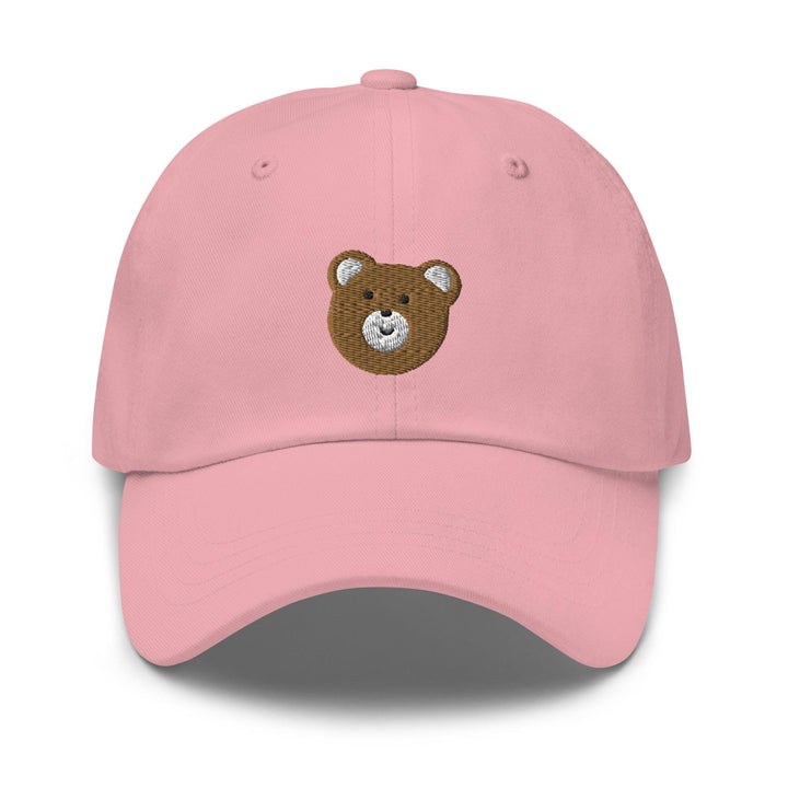 a pink hat with a teddy bear embroidered on it