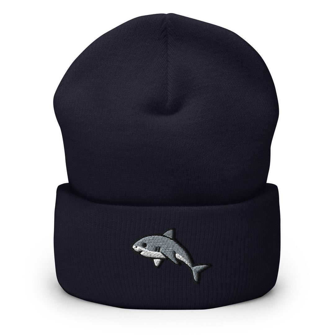 a black beanie with a shark embroidered on it