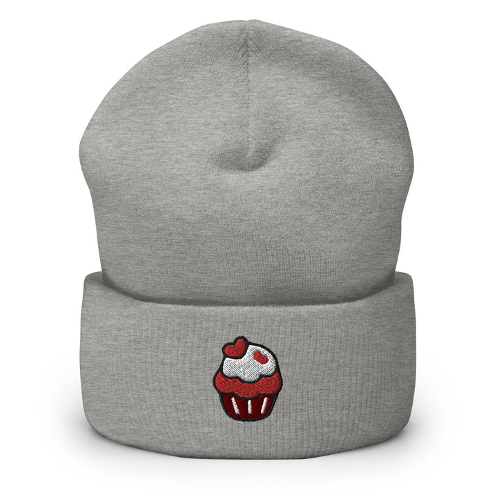 a gray beanie with a cupcake embroidered on it
