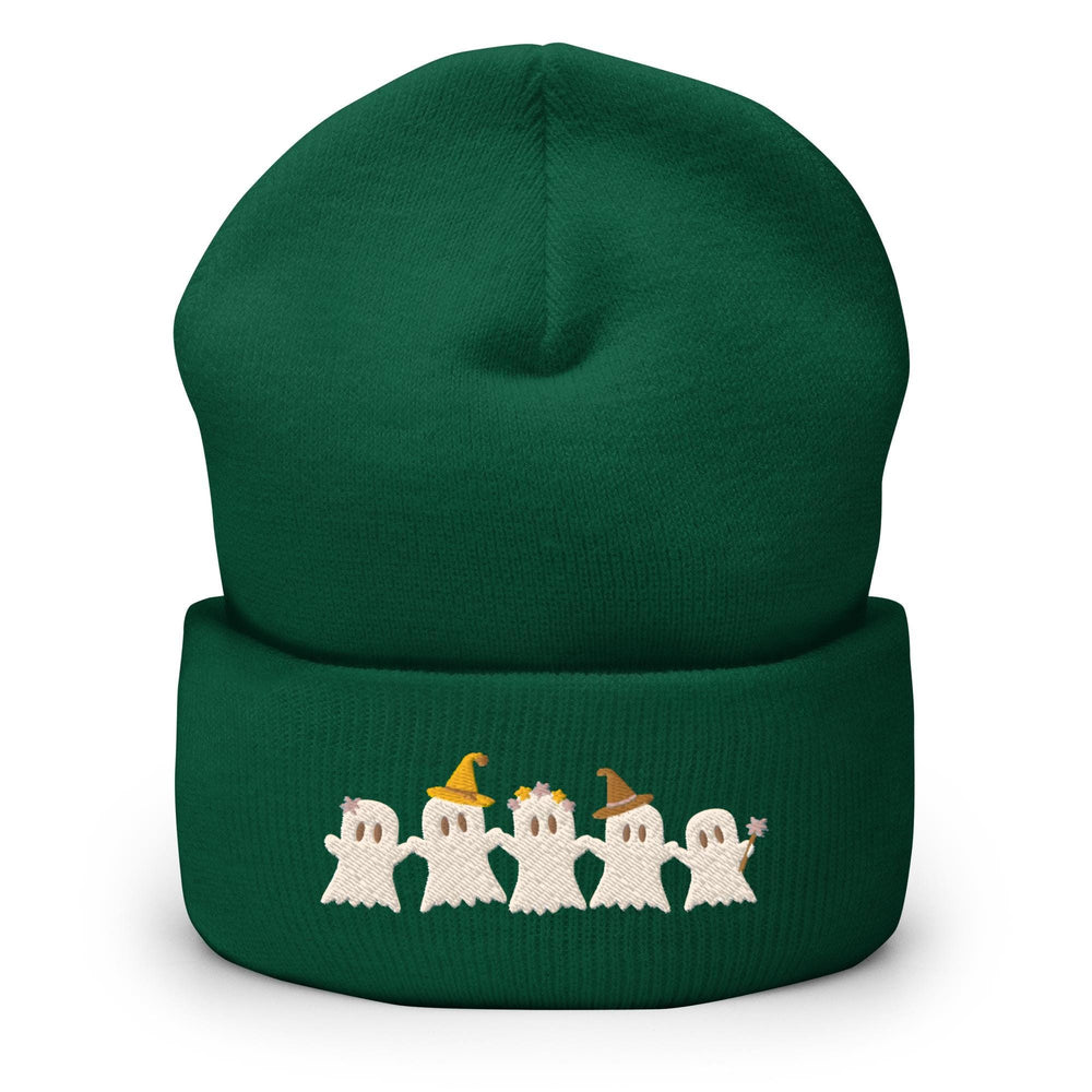 a green beanie hat with a group of ghost on it