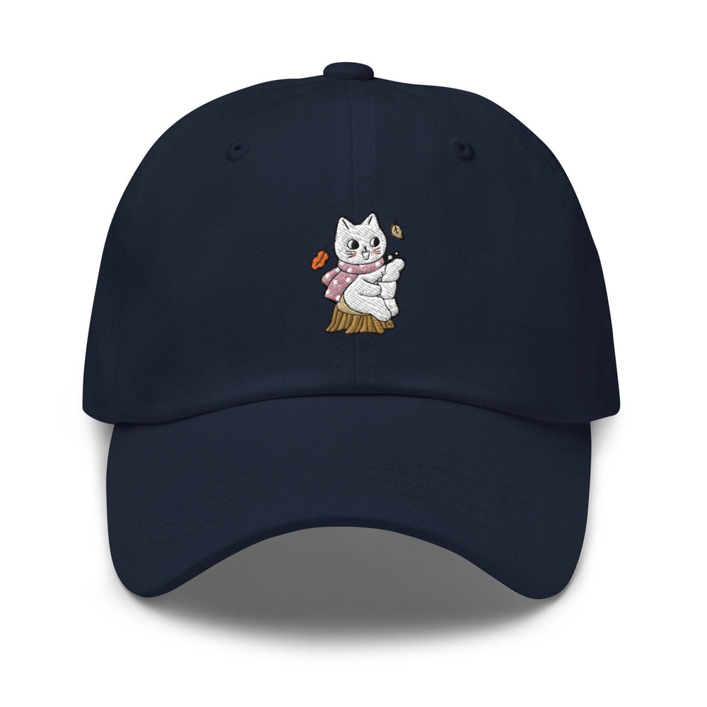 a baseball cap with a cat holding a hot dog