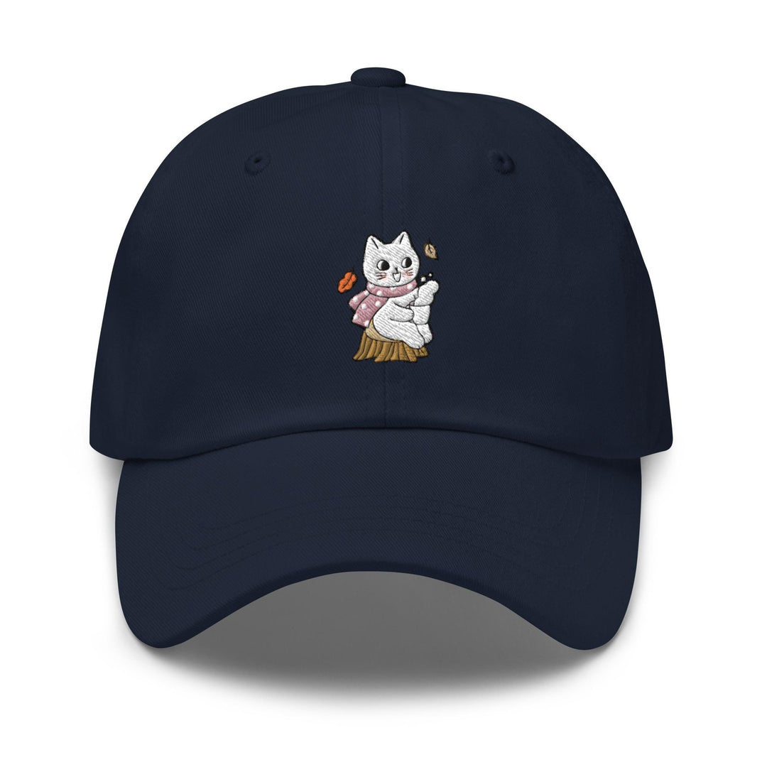 a baseball cap with a cat holding a hot dog
