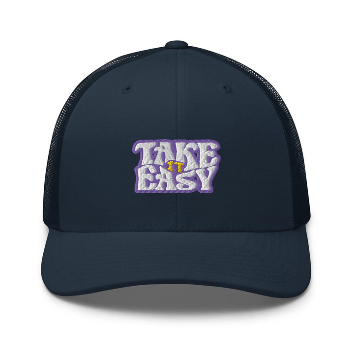 a blue trucker hat with the words take easy on it
