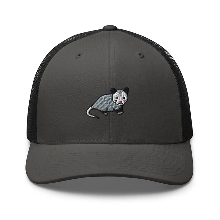 a gray and black trucker hat with a panda bear embroidered on the front