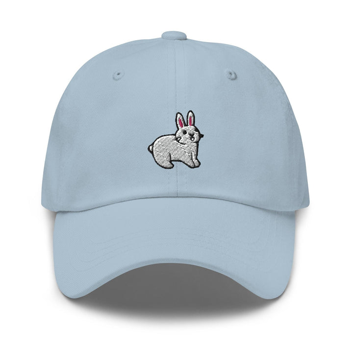 a light blue hat with a white rabbit embroidered on the front