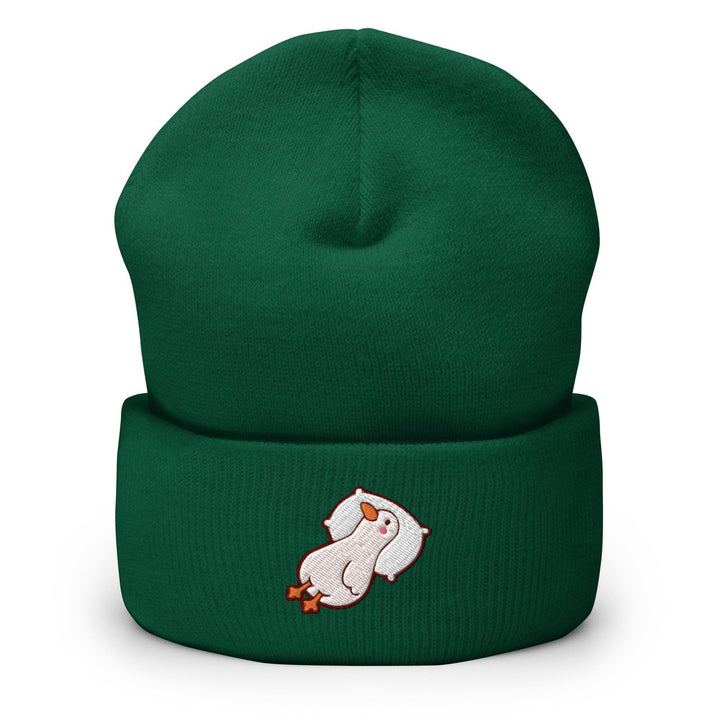 a green beanie with a white bear on it