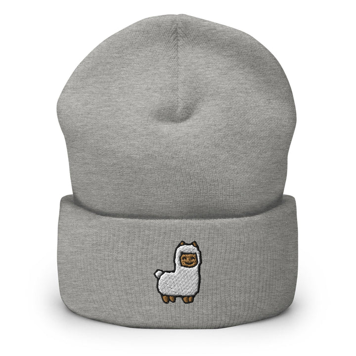a grey beanie with a white llama on it