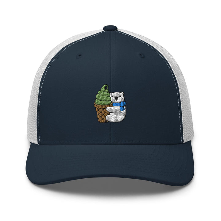 a blue and white trucker hat with an image of an owl holding an ice