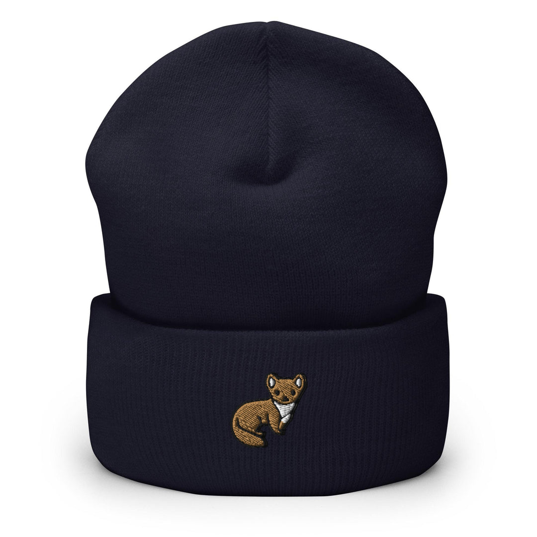 a blue beanie with a brown bear embroidered on it