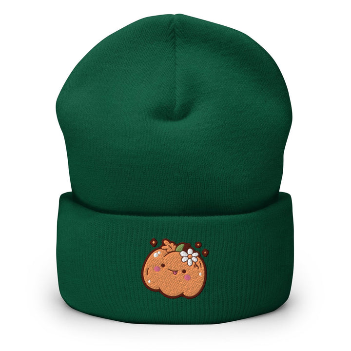 a green beanie with a picture of a ginger on it