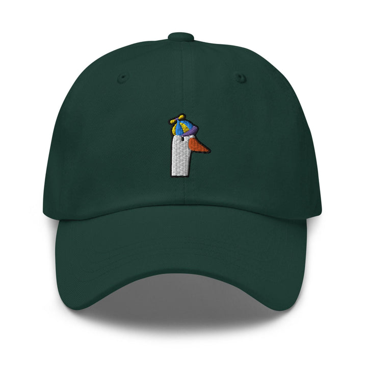 a green hat with a bird on top of it
