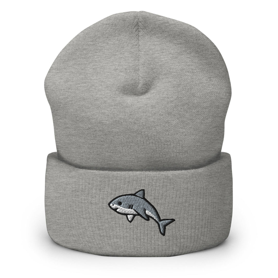 a gray hat with a shark embroidered on it
