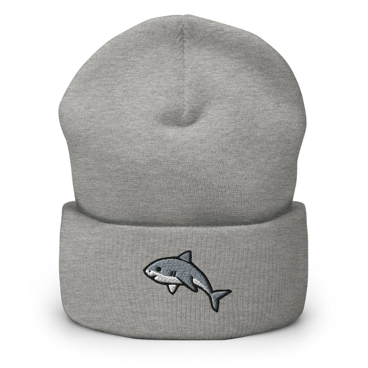 a gray hat with a shark embroidered on it