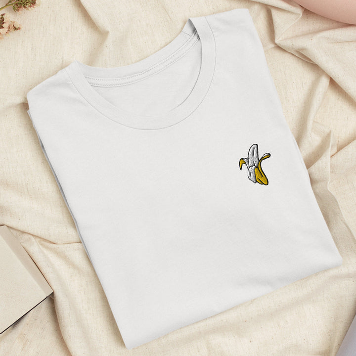 a white t - shirt with a banana embroidered on it