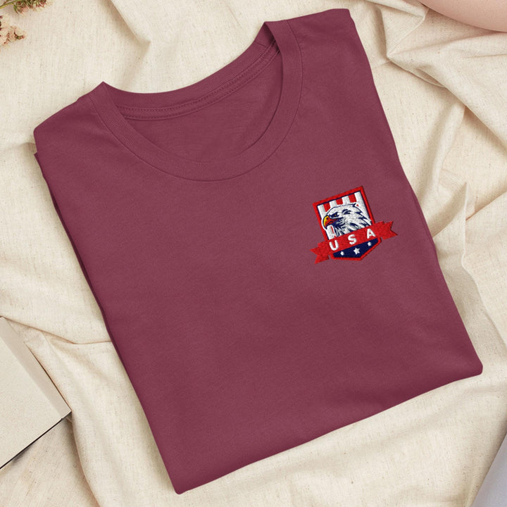 a red shirt with a picture of a dog on it