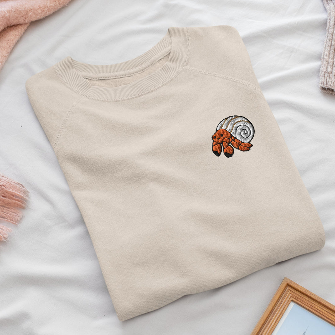 a t - shirt with a picture of an orange cat on it
