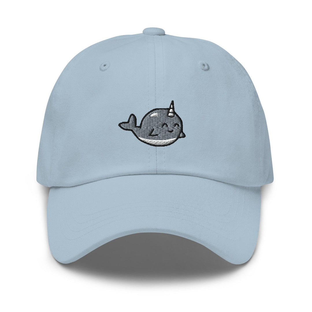 a light blue hat with a whale embroidered on it