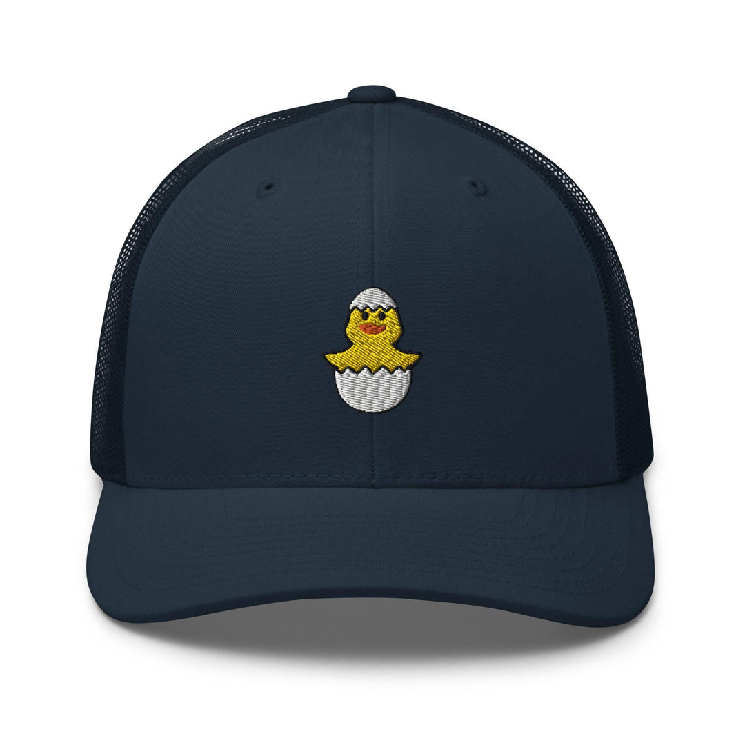 a blue trucker hat with a yellow chick on it