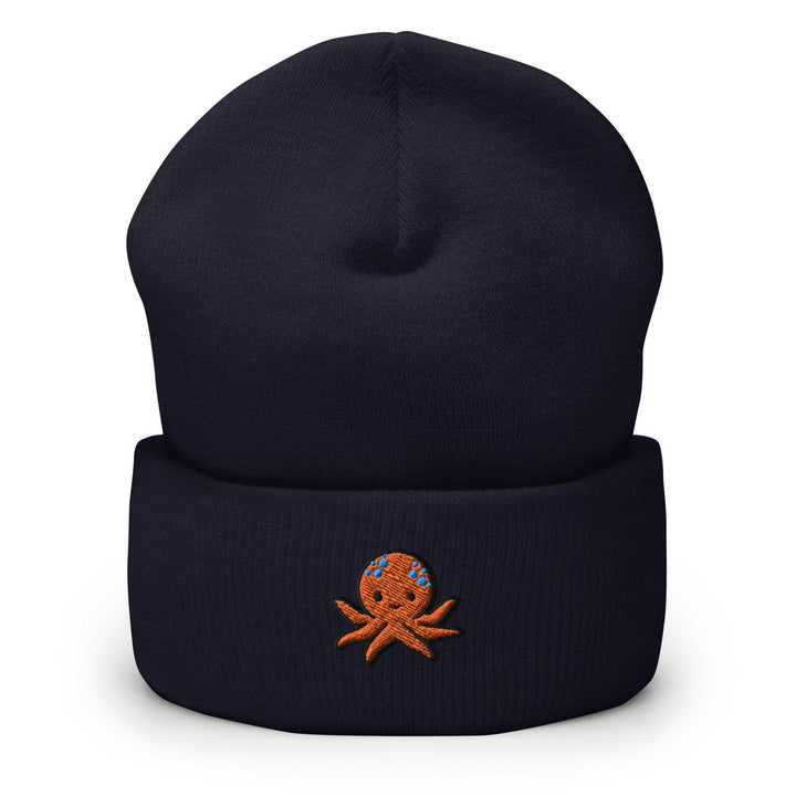 a blue beanie with an octopus embroidered on it