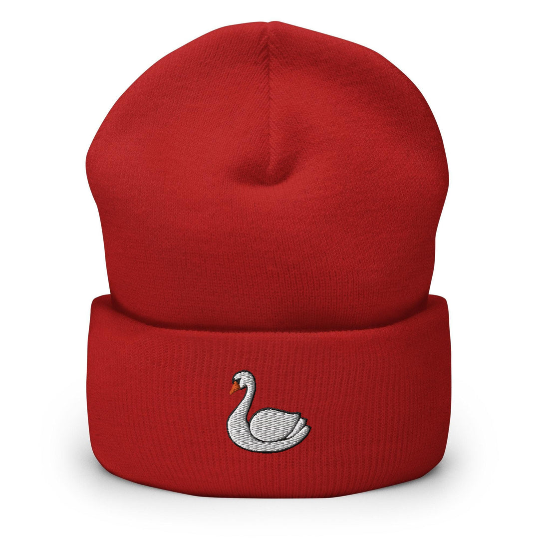 a red beanie with a white swan embroidered on it