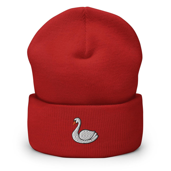 a red beanie with a white swan embroidered on it