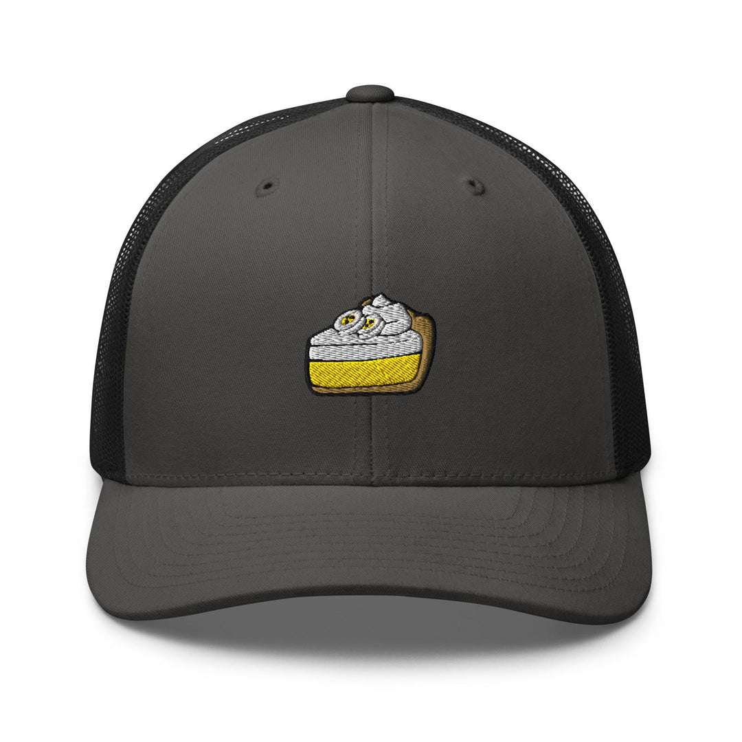 a gray trucker hat with a picture of a piece of cake on it