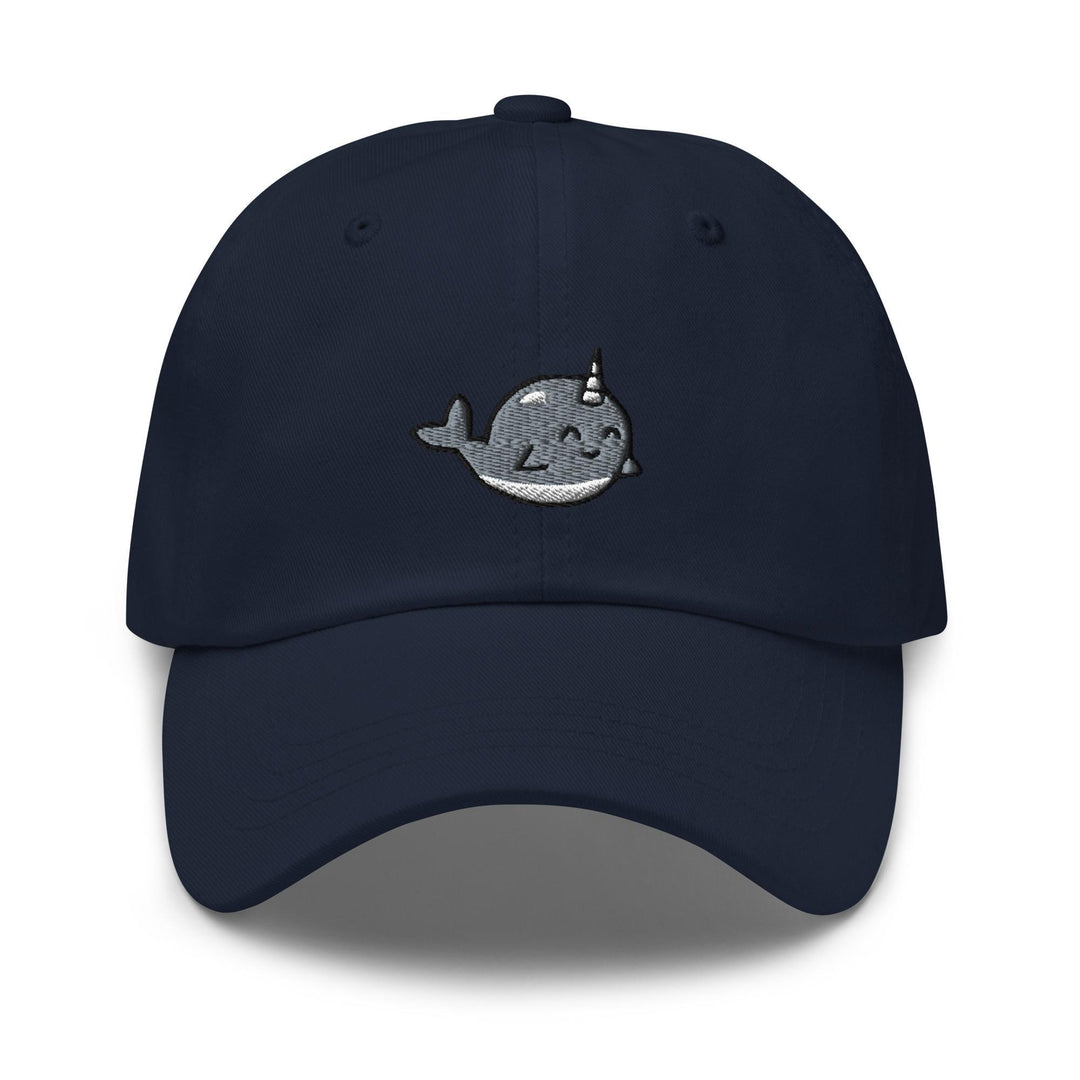 a navy hat with a whale embroidered on it