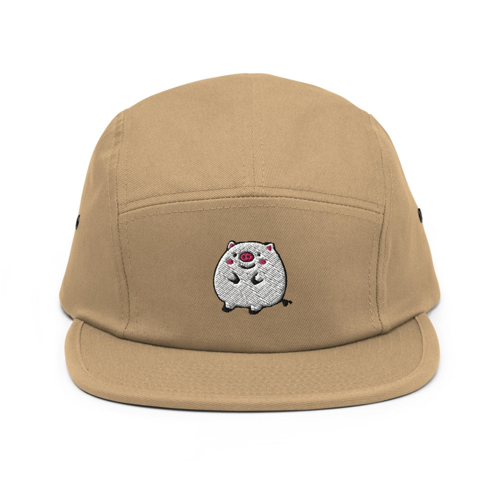 a tan hat with a white dog embroidered on it