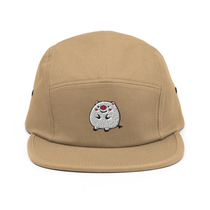 a tan hat with a white dog embroidered on it
