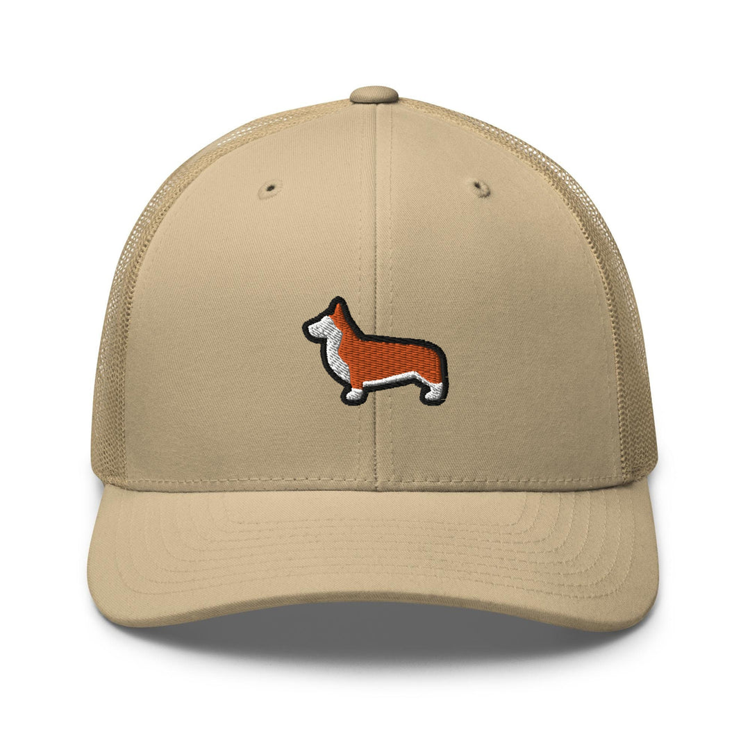 a tan trucker hat with a corgi embroidered on the front