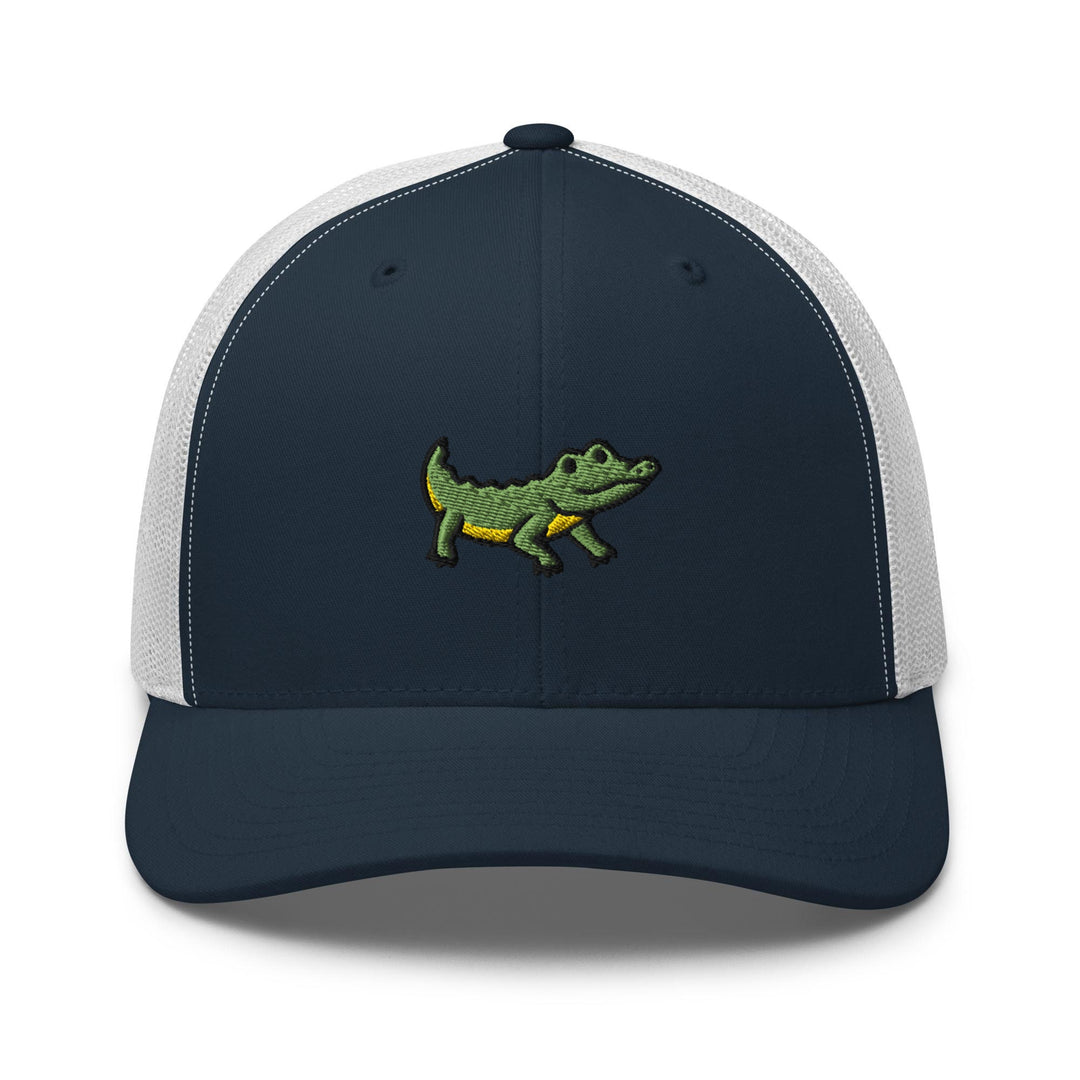 a hat with a crocodile embroidered on the front