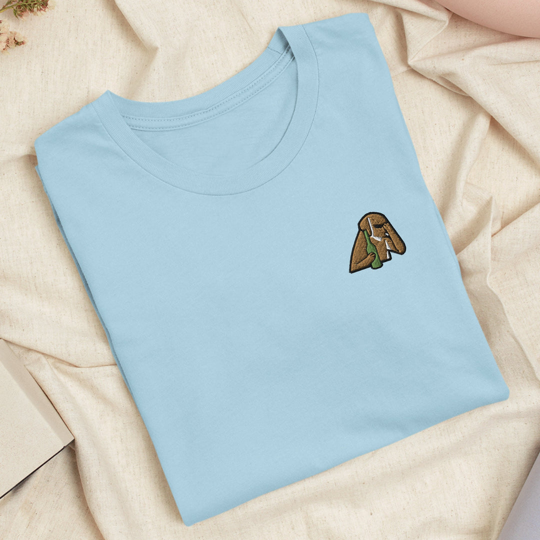 a blue t - shirt with a picture of a dog on it