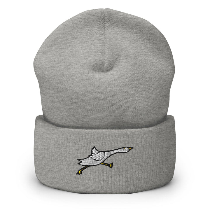 a grey beanie with a white duck on it