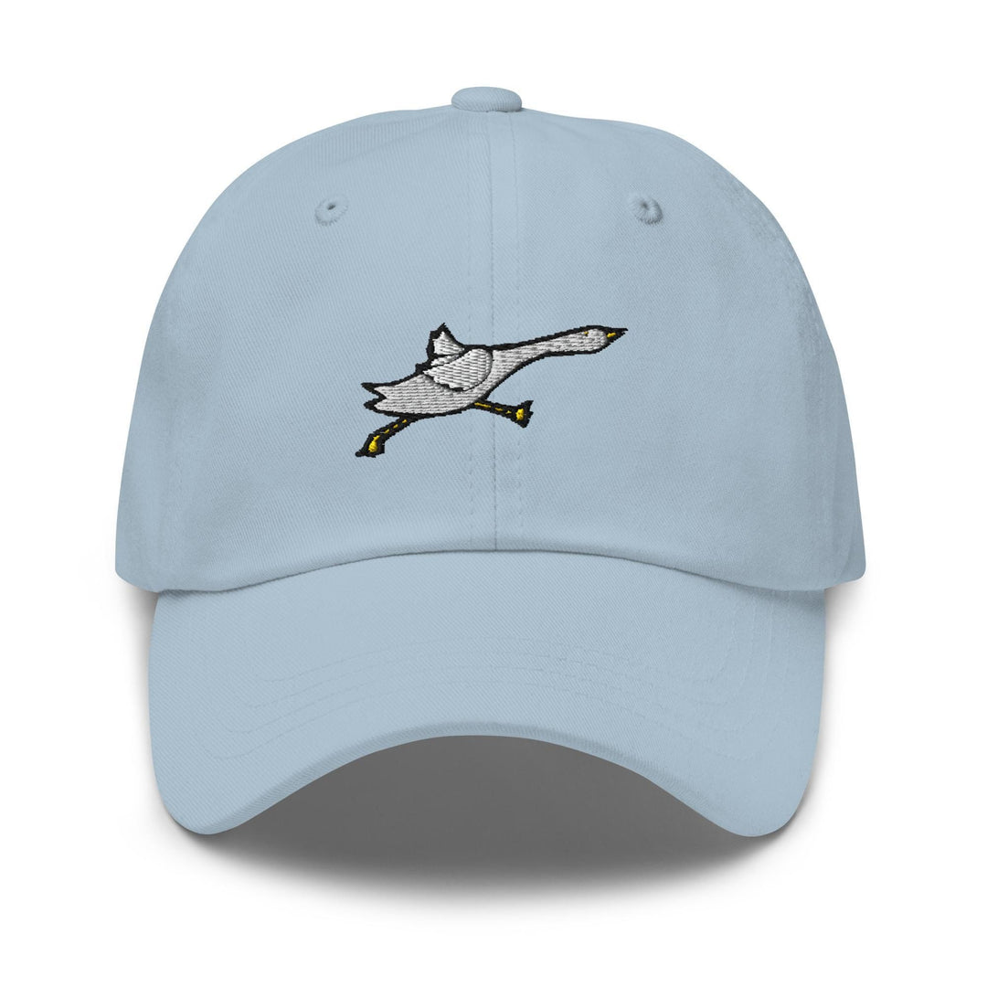 a light blue hat with a bird embroidered on it
