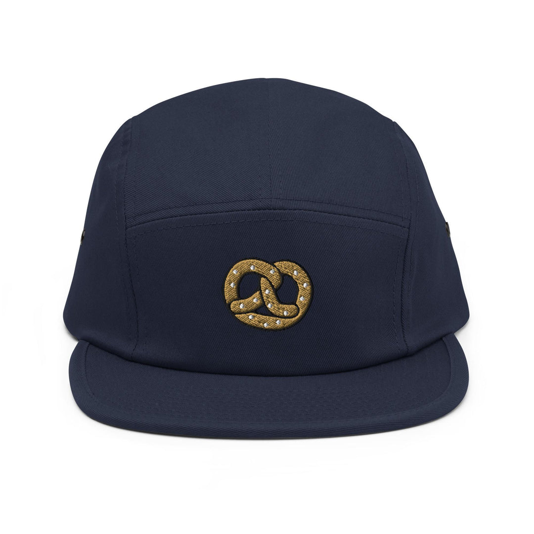 a blue hat with a gold chain on it