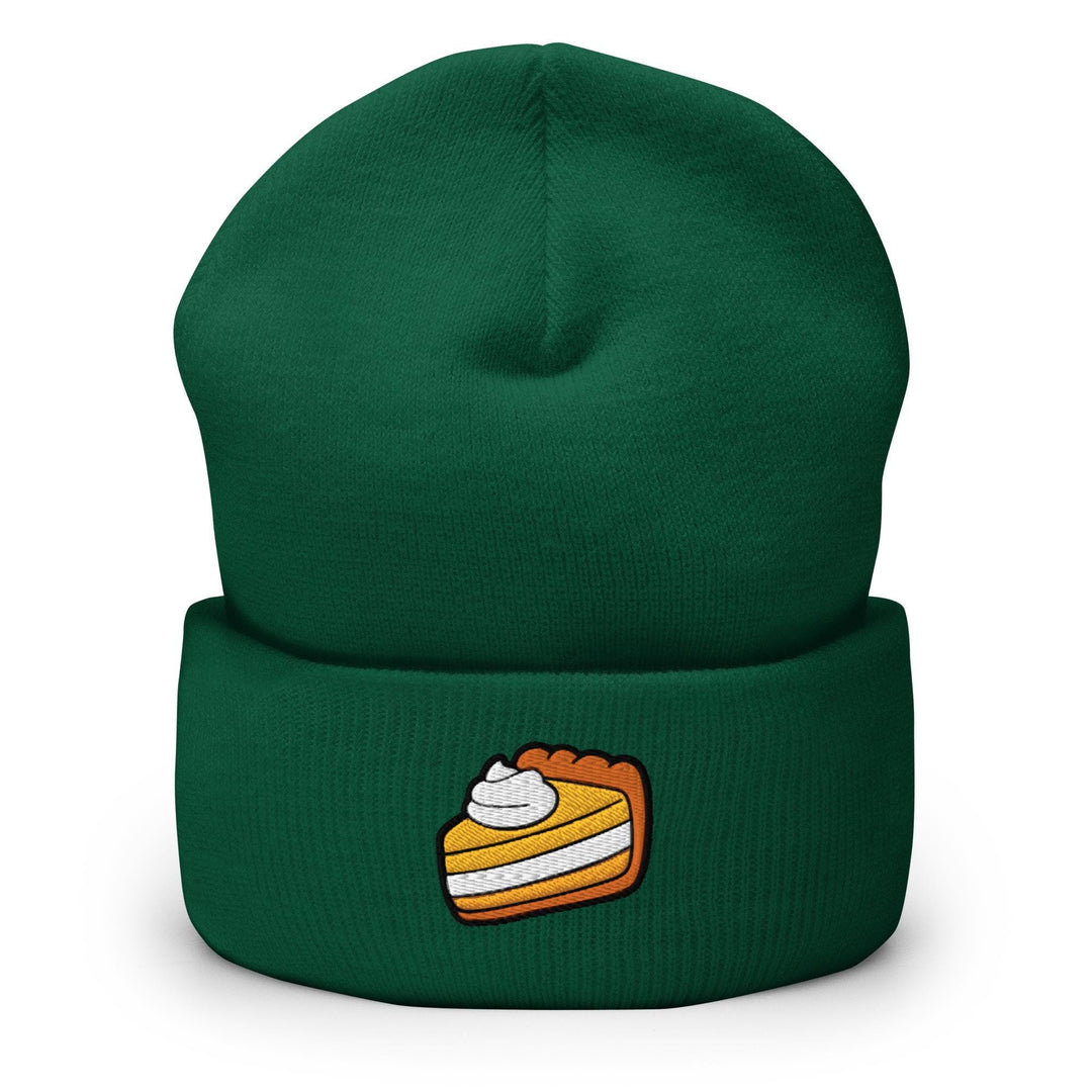 a green beanie with a piece of cake on it
