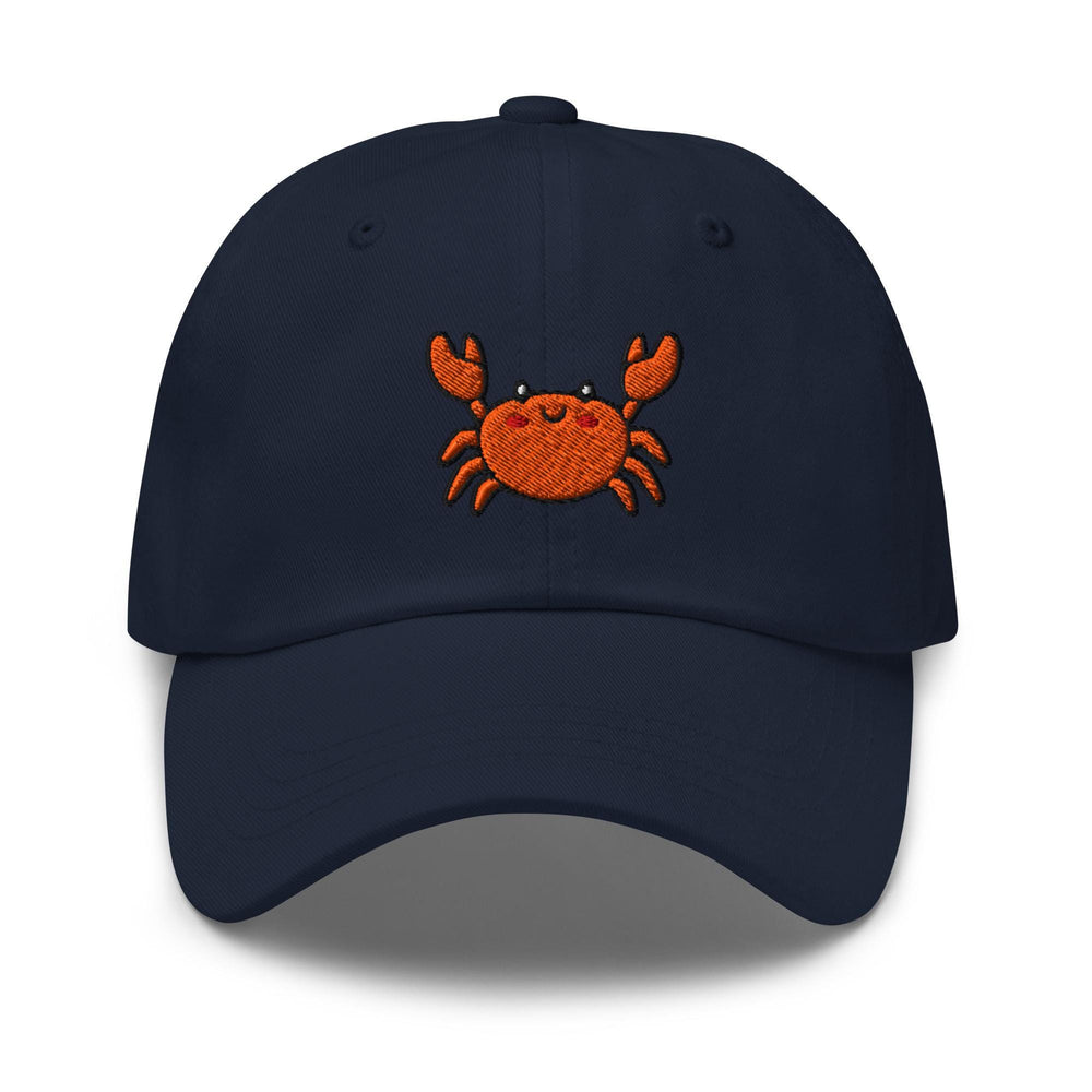 a blue hat with a crab embroidered on it
