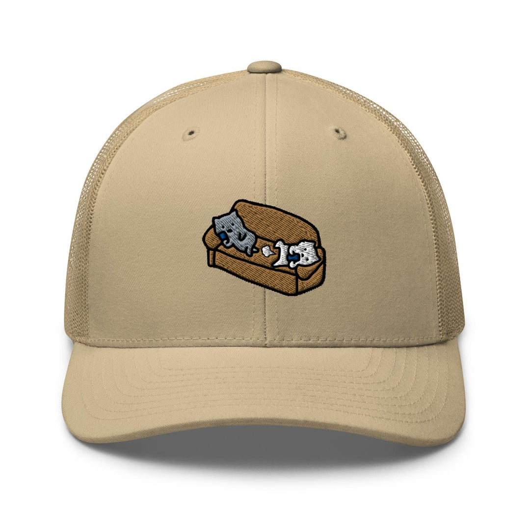 a tan trucker hat with two cats on it