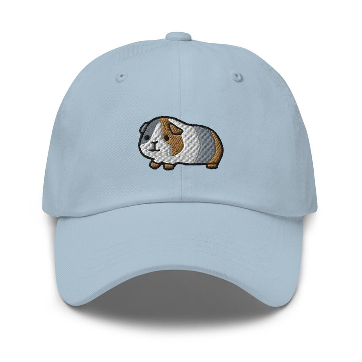 a light blue cap with a guinea pig embroidered on the front