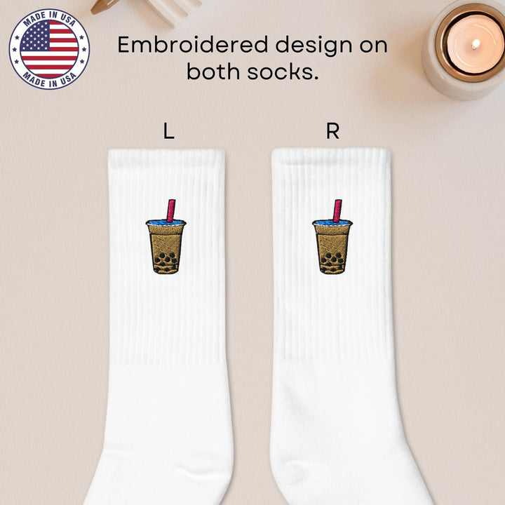 a pair of socks with a picture of a drink on them