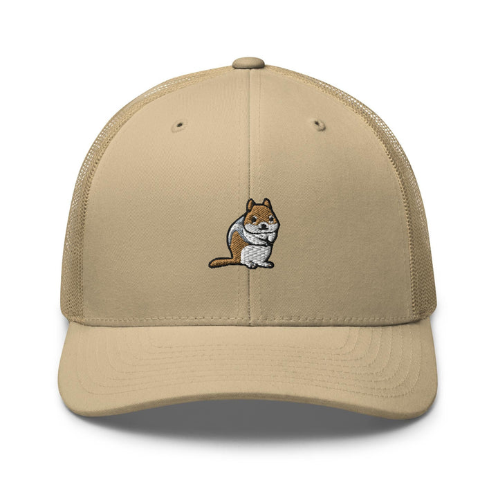 a tan trucker hat with a brown and white cat embroidered on the front
