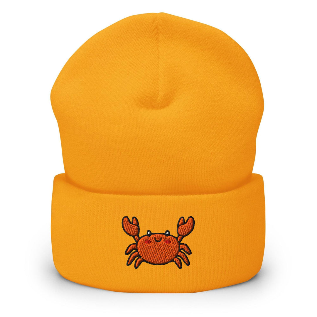 a yellow hat with a crab embroidered on it
