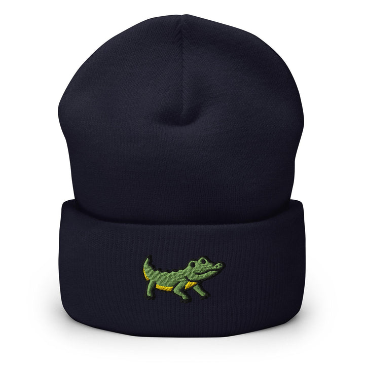 a beanie with a crocodile embroidered on it