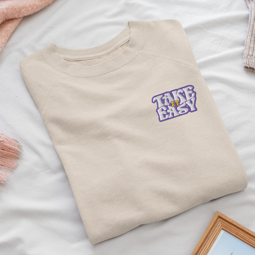 a t - shirt that says take easy on it