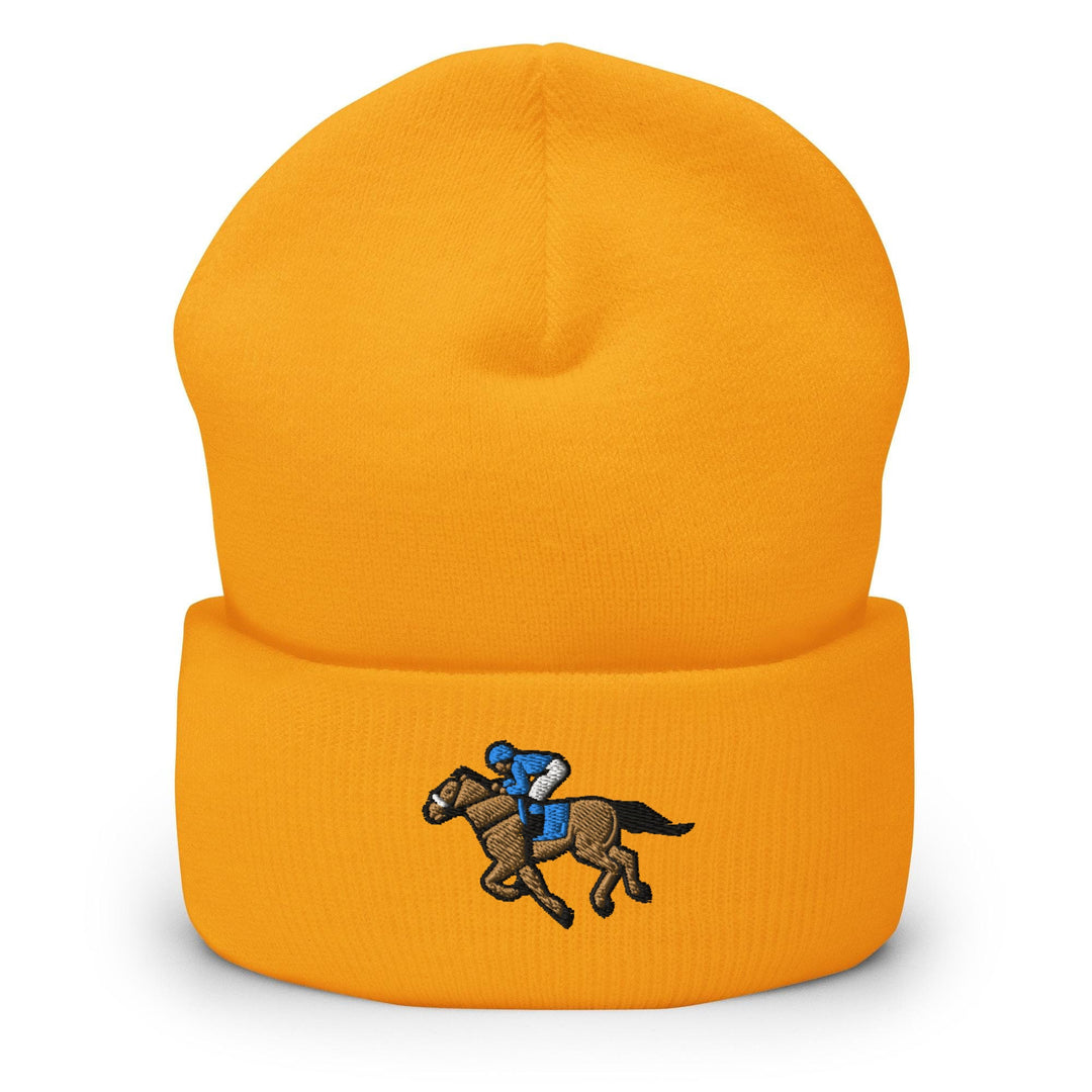 a yellow hat with a horse and jockey on it
