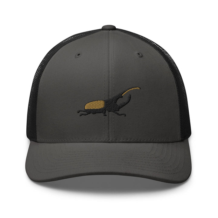 a gray and black hat with an alligator on it