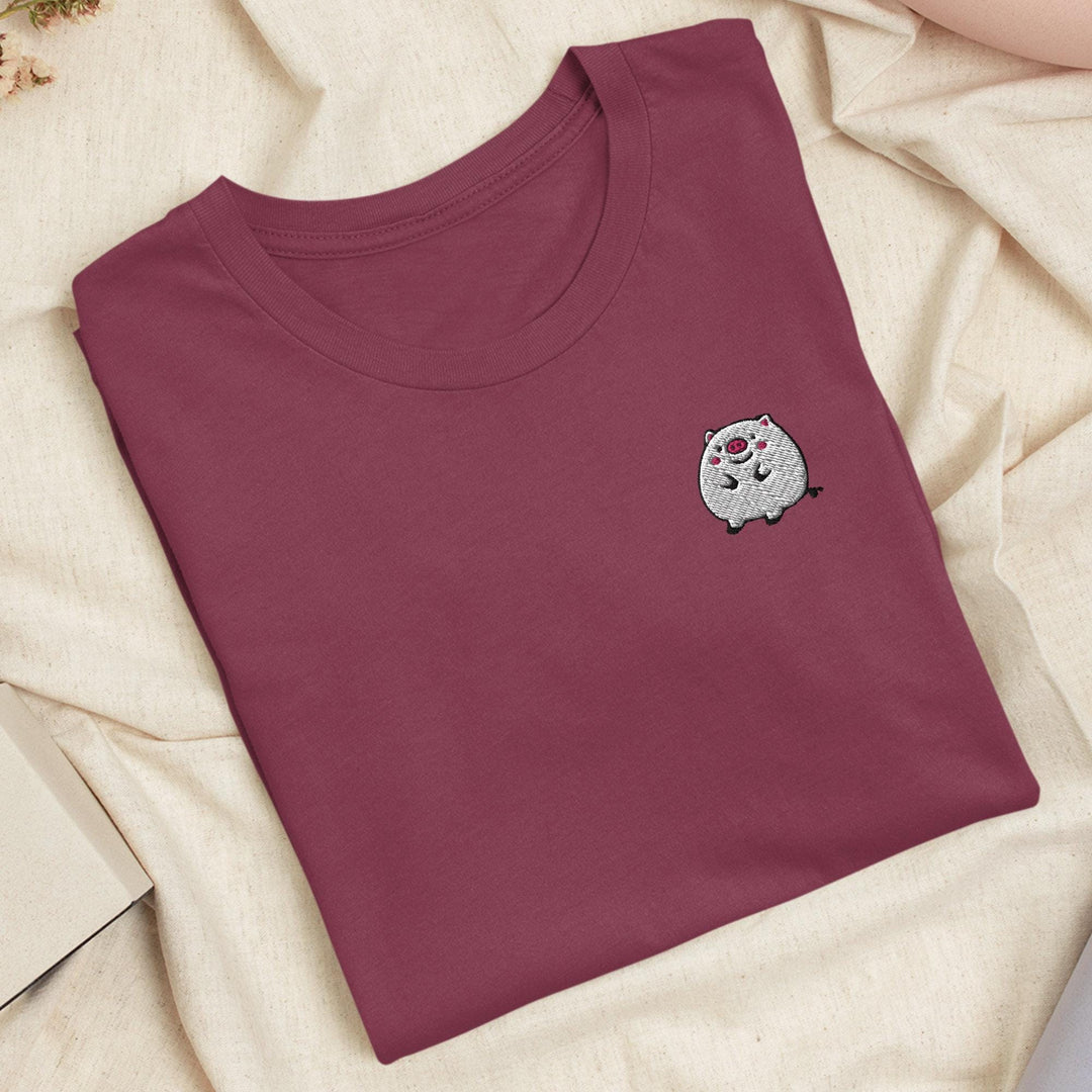 a red t - shirt with a white cat on it