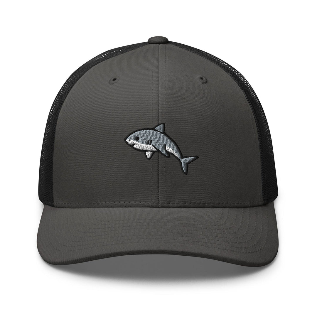 a gray and black trucker hat with a shark embroidered on the front